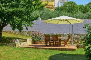 Сад в Villa Giardina Apartments