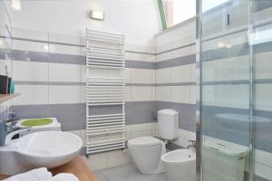 Ванная комната в Villa Giardina Apartments