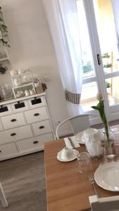 Kuchyň nebo kuchyňský kout v ubytování aMarti Suites B&B