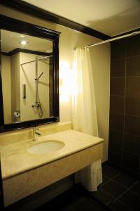 Ванная комната в Hotel Mimosa