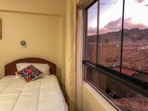 Voodi või voodid majutusasutuse Hawka Inka Hostal - Cusco toas