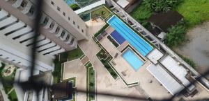 an overhead view of a house with a swimming pool at FORTALEZA APTo INTEIRO 5 HOSPEDES in Fortaleza
