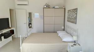 Posteľ alebo postele v izbe v ubytovaní Studio Apartment Luce
