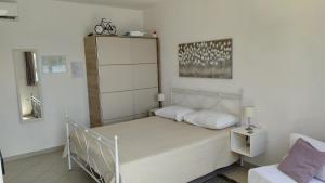 Posteľ alebo postele v izbe v ubytovaní Studio Apartment Luce