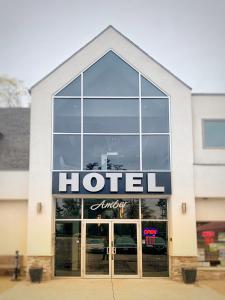 a hotel sign on the front of a building at Amber Hotel in Grand Bend