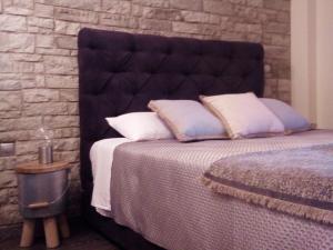 Ένα ή περισσότερα κρεβάτια σε δωμάτιο στο Lux Studio 1