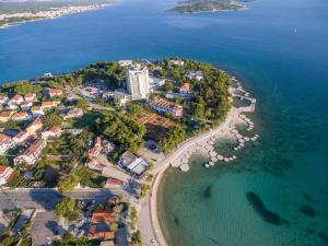an aerial view of a small island in the water at Apartments Sanja in Vodice