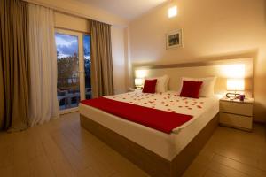 Postel nebo postele na pokoji v ubytování Iveria Elli Hotel