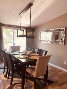 a dining room with a table and chairs at Sedona Red Rock Garden of Paradise Pets friendly and Hot tub in Sedona