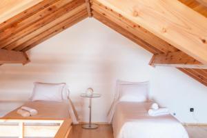 Caparica Azores Ecolodge客房内的一张或多张床位