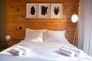 Caparica Azores Ecolodge客房内的一张或多张床位