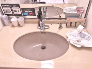 a bathroom counter with a sink and a mirror at Hotel Pal Anesso Nakatsu (Love Hotel) in Nakatsu