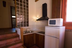 Kuchyň nebo kuchyňský kout v ubytování Casas Rurales el Cerrete de Haro