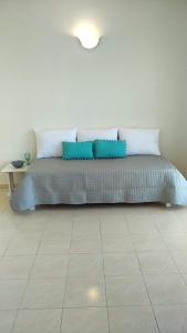 Postel nebo postele na pokoji v ubytování Joy Apartments Zakynthos