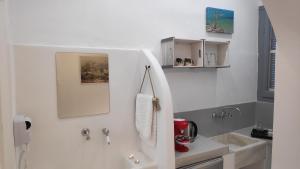 Kúpeľňa v ubytovaní Grey Rooms Naxos