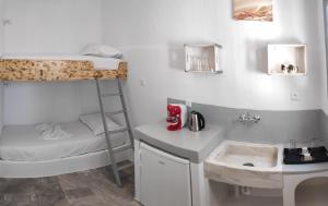 Posteľ alebo postele v izbe v ubytovaní Grey Rooms Naxos