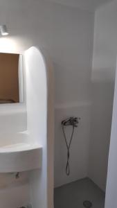 Kúpeľňa v ubytovaní Grey Rooms Naxos