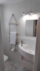 Kúpeľňa v ubytovaní Grey Rooms Naxos