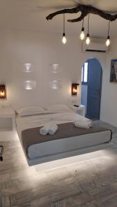 Posteľ alebo postele v izbe v ubytovaní Grey Rooms Naxos
