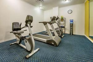 a gym with two exercise bikes and a treadmill at Inn at Lebanon - Hershey & Manheim area in Lebanon