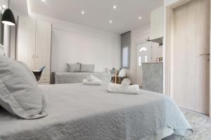 Postel nebo postele na pokoji v ubytování Skalidis Apartments Stalis