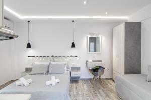 Postel nebo postele na pokoji v ubytování Skalidis Apartments Stalis
