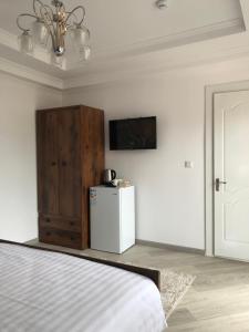 TV a/nebo společenská místnost v ubytování Guest House “Aura”