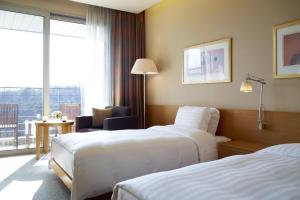 Katil atau katil-katil dalam bilik di Rolling Hills Hotel