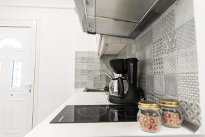 Kuchyň nebo kuchyňský kout v ubytování Skalidis Apartments Stalis
