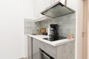 Kuchyň nebo kuchyňský kout v ubytování Skalidis Apartments Stalis