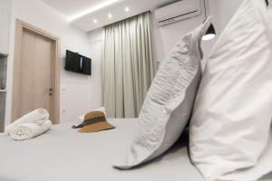 Postel nebo postele na pokoji v ubytování Skalidis Apartments Stalis