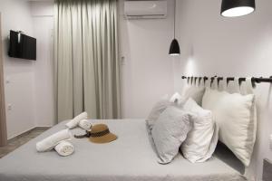 Postel nebo postele na pokoji v ubytování Skalidis Apartments Stalis