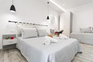 Postel nebo postele na pokoji v ubytování Skalidis Apartments Stalis