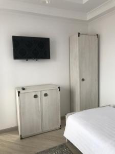 Postel nebo postele na pokoji v ubytování Guest House “Aura”