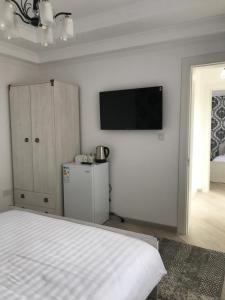 Postel nebo postele na pokoji v ubytování Guest House “Aura”