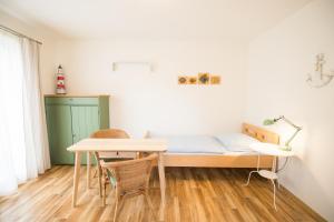 Posteľ alebo postele v izbe v ubytovaní Apartmány Lea