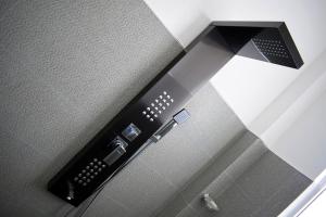 TV a/nebo společenská místnost v ubytování Raveena Guest House