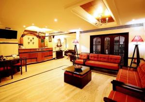 The lobby or reception area at Yuvarani Residency