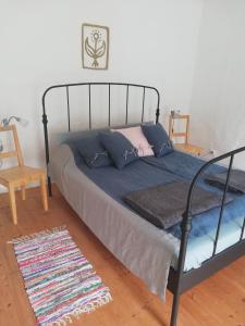 Postel nebo postele na pokoji v ubytování Szálkai Vályogház Vendégház