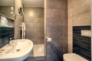 Koupelna v ubytování Hotel l'adresse garni
