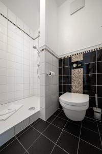 Koupelna v ubytování Hotel l'adresse garni