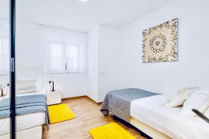 Postel nebo postele na pokoji v ubytování Stella Apartment