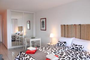 Postel nebo postele na pokoji v ubytování Playa Roca Casa Candela