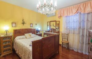 Ένα ή περισσότερα κρεβάτια σε δωμάτιο στο Casa Pilar con piscina +40 φωτογραφίες