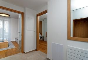 Postel nebo postele na pokoji v ubytování Apartments Residence Grand