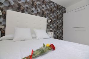 Ein Bett oder Betten in einem Zimmer der Unterkunft Hotel Castillo Benidorm