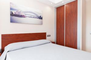Posteľ alebo postele v izbe v ubytovaní Hotel Olympia Ronda I
