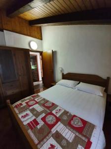 A bed or beds in a room at La casina