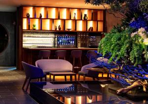 a bar with chairs and a counter in a room at HOTEL＆SPA CENTURY MARINA HAKODATE in Hakodate +26 photos