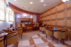 Restoranas ar kita vieta pavalgyti apgyvendinimo įstaigoje Hotel Persico's